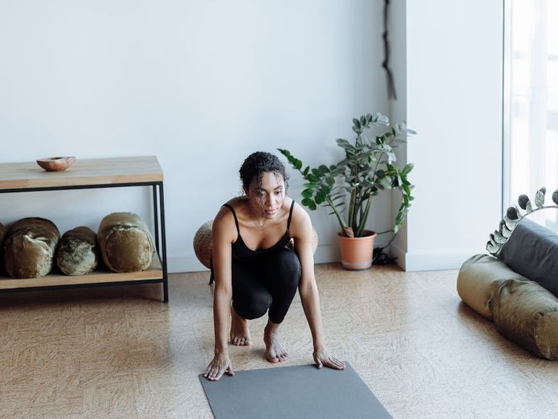 Detailed view of yoga equipment and floor space for practice.